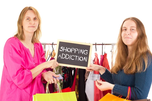 2 ladies displaying a shopping addiction