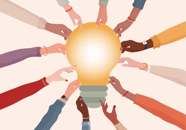  Hands of diverse and multi-ethnic people holding a light bulb. Innovative business ideas metaphor. Banner copy space. Teamwork. Agreements and business between colleagues 