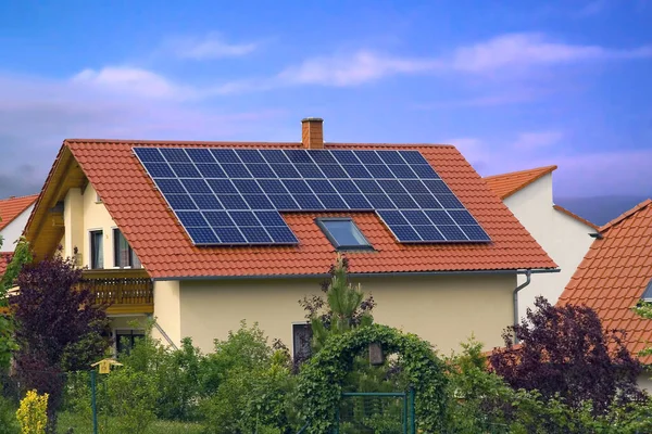 red brick house with solar panels